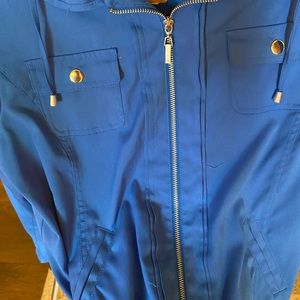 blue rain jacket Allison Daley